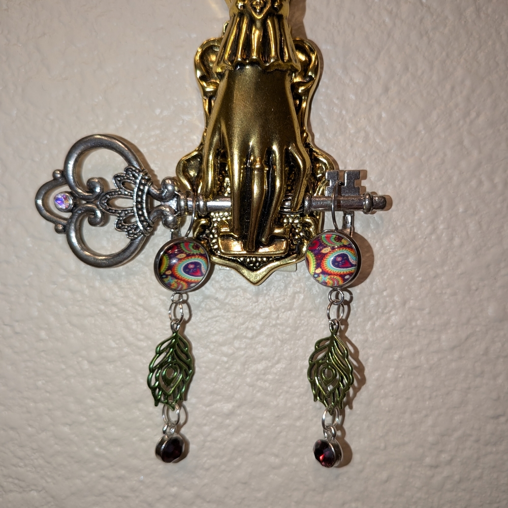 Vibrant Paisley Drop Earrings with Green Accents